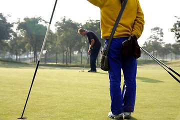 Image showing caddie at work