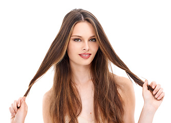 Image showing Hair, beauty and portrait of a woman with cosmetics, makeup and shampoo product for shine and growth. Face of female model on white background happy about hairdresser and salon advertising in studio