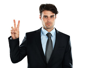 Image showing Hand sign, peace and businessman with ambition in studio for vision, mindset and white background. Peace sign, emoji and young entrepreneur serious about startup, idea and career goal while isolated