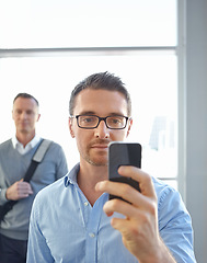 Image showing Accountant, phone or business man in Dubai airport for invest strategy, finance growth or financial review. Travel, manager or CEO on smartphone for social media, data analysis or economy research