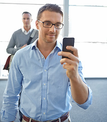 Image showing Smile, travel or business man with phone in airport for invest strategy, finance growth or financial review. CEO or corporate manager on smartphone planning, data analysis or economy data research