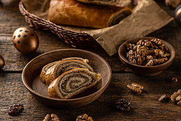 Image showing Home baked walnut roll,