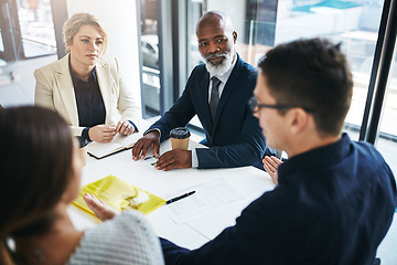 Image showing Business people, meeting and team discussion for strategy, marketing or collaboration at the office. Group of employee workers in business meeting, teamwork or coaching for sales at the workplace