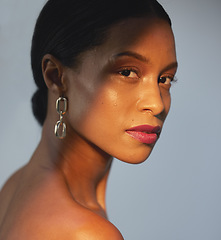 Image showing Portrait, beauty and skincare with a model black woman in studio on a gray background for natural care. Face, cosmetics and wellness with an attractive young female posing to promote a luxury product