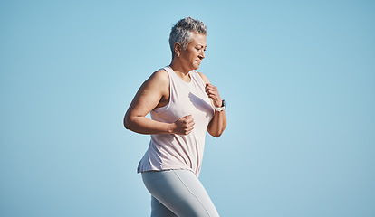 Image showing Fitness, nature and senior woman running for health, wellness and exercise in Puerto Rico. Sports, runner and elderly female athlete doing an outdoor cardio workout training for a marathon or race.