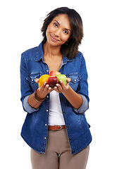 Image showing Portrait, fruits or black woman with an orange or apple in studio on white background for healthcare or vegan diet. Smile, wellness or healthy African girl model happy with organic food or vitamin c