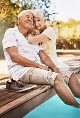 Image showing Senior couple, relax and smile for pool, love and summer vacation, bonding or quality time together in the outdoors. Happy elderly man and woman relaxing and hugging with feet in water by a poolside