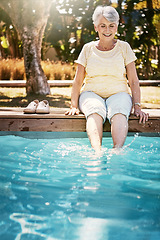 Image showing Summer, senior woman and feet in swimming pool, relax and on weekend break, happiness and calm. Stress relief, mature female and lady legs in water, holiday and vacation with retirement and sunshine