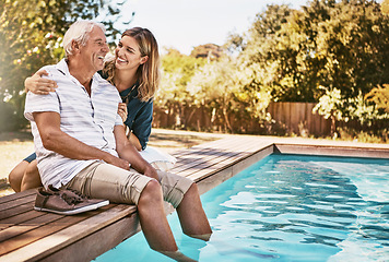 Image showing Senior couple, swimming pool and relax happiness on travel holiday or summer vacation outdoor. Elderly man, woman smile and conversation, happy bonding and calm peace for support or relaxing together
