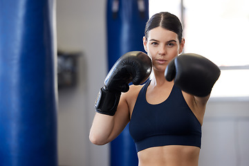 Image showing Fitness, kickboxing and portrait of woman athlete doing a cardio workout while training for a match. Sports, exercise and female boxer getting ready for a fight in sport, wellness and health gym.