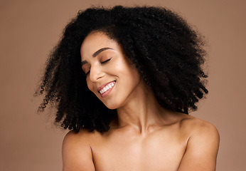 Image showing Hair care, afro beauty and face of black woman with clean shampoo hair, healthy hair growth and happy with spa salon treatment. Wellness, trichology and model with skincare glow, makeup and cosmetics