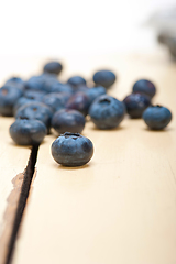 Image showing fresh blueberry on white wood table