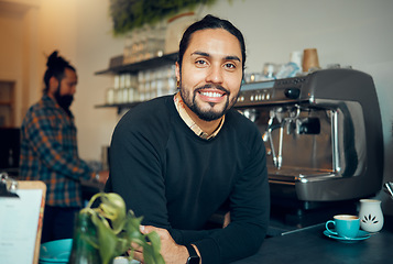 Image showing Portrait, coffee shop and barista with a man at work behind the counter in a cafe or restaurant as a waiter. Manager, retail or small business with a male employee working in a cafeteria for service