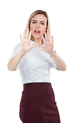 Image showing Warning, stop and portrait of a woman with hands isolated on a white background. Unhappy, frustrated and angry girl with a hand gesture for stopping, defending or problem on a studio background