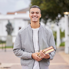 Image showing Study, books and student portrait at university, college or campus for research, knowledge and scholarship motivation. Happy young man with outdoor learning for exam, studying and reading inspiration