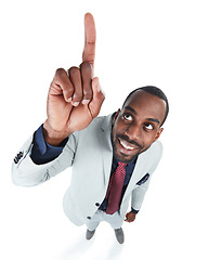 Image showing High angle, businessman and pointing up on isolated white background, marketing space and advertising mockup. Smile, happy and corporate worker in creative pov with showing hands gesture on mock up