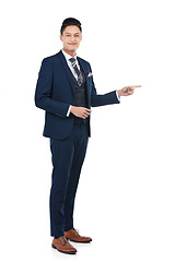 Image showing Smile, portrait or pointing businessman on isolated white background, marketing space or advertising mockup. Happy, asian and corporate worker face with show hand gesture at financial investment deal