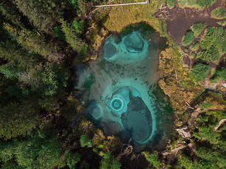 Image showing Geyser (blue, silver) lake with thermal springs