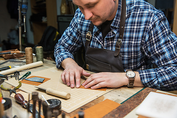 Image showing Concept of handmade craft production of leather goods.