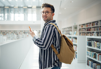 Image showing Student man, library portrait and phone, smile and chat on social media for communication. College student, smartphone and app for university email in education, learning and studying for future goal