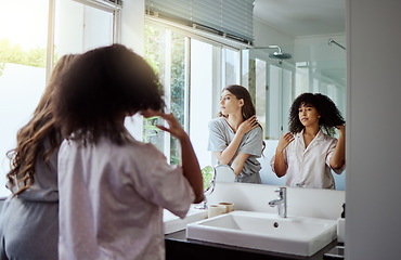 Image showing Women, bonding or grooming in home bathroom for morning routine, house healthcare wellness or relax skincare. People, girls or friends in hair care beauty, mirror self love or luxury trendy hairstyle