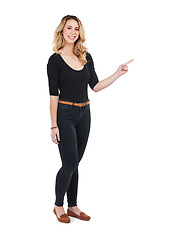 Image showing Presentation, teaching and portrait of a woman pointing isolated on a white background in studio. Product placement, advertising direction and girl marketing a brand or product on a studio background