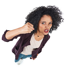 Image showing Angry, crazy and portrait of a black woman with a fist for a fight isolated on a white background. Conflict, anger and African girl frustrated, threatening and violent on a studio background