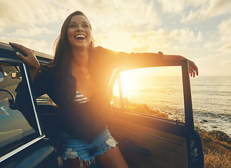 Image showing Happy, car and woman on a road trip at the beach for summer, freedom and travel in Spain. Smile, adventure and girl driving on holiday at the ocean for happiness, content and peace with transport