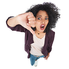 Image showing Portrait, thumbs down and top view of black woman in studio isolated on white background. Dislike emoji, failure hand gesture and angry female with sign for disagreement, rejection or negative review