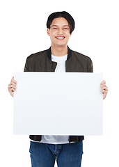 Image showing Smile, portrait and Asian man with poster for mockup, marketing or advertising space in studio isolated on white background. Product placement, branding and male with banner for mock up or promotion.