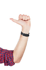 Image showing Hand, thumb and mockup with a man in studio isolated on a white background for a logo or brand. Social media, emoji and gesture with a male making a sign on blank mock up space for branding