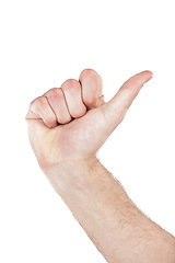 Image showing Sign language, hand and thumb pointing in a studio for direction, communication or counting. Finger, body language and man with a hand gesture isolated by a white background with mockup space.