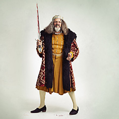 Image showing King, portrait and man with bloody sword in studio isolated on a gray background mock up. Victorian villain, medieval royal or mature male, evil ruler or angry leader holding steel blade after battle