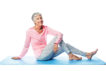 Image showing Yoga portrait, senior and woman in studio isolated on a white background. Zen chakra, pilates fitness and retired, elderly and happy female sitting on mat after training for wellness and health.