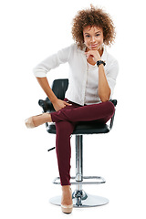 Image showing Confident, happy and portrait of a black woman on a chair isolated on a white background in studio. Professional, young and beautiful, African and smiling girl sitting on a studio background