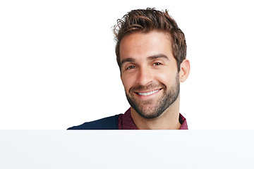 Image showing Man, smile and portrait of a model face with happiness and mock up space for advertisement. White background, isolated and happy male with mockup smiling in a studio feeling positive and attractive