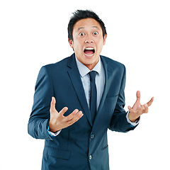 Image showing Angry, frustrated and portrait of a surprised Asian man isolated on a white background in a studio. Shocked, unhappy and amazed Japanese businessman screaming and shouting on a studio background
