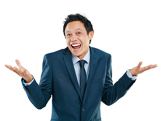 Image showing Portrait, shrug and excited with a business asian man in studio isolated on a white background for promotion. Comic, success and motivation with a male employee shrugging his shoulders on blank space