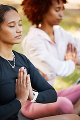 Image showing Women friends, namaste hands and yoga meditation at park, wellness and freedom of chakra energy, zen fitness or peace. Calm girls, relax exercise and meditate with prayer in nature for mental health