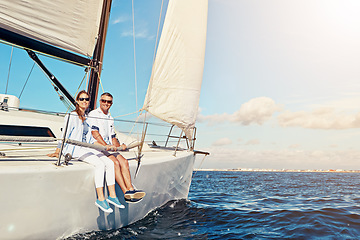 Image showing Vacation, ocean and portrait of a couple on a yacht for adventure, freedom and sailing trip. Travel, summer and mature man and woman on a boat in the sea for a romantic seaside holiday in Greece.