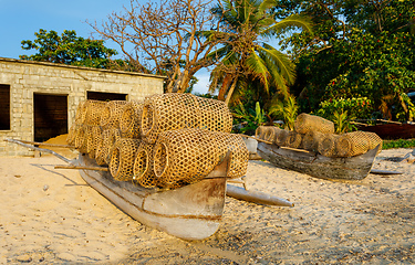 Image showing traditional malagasy fishing boat with trap on beach