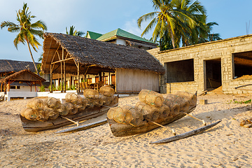 Image showing traditional malagasy fishing boat with trap on beach