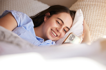 Image showing Phone, bed and relax woman typing post to social media app, online blog or doing internet web search. Bedroom, networking communication or gen z girl reading meme, news or contact social network user