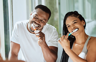 Image showing Black couple, brushing teeth and dental cleaning in bathroom together for grooming hygiene, beauty wellness and healthcare with toothbrush. African man, woman and happy oral care morning routine