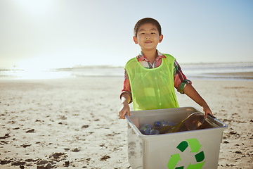 Image showing Beach cleaning, recycle box and kid with plastic bottle, recycling portrait and climate change, sustainability and volunteer mockup. Eco friendly activism, community service and boy clean outdoor