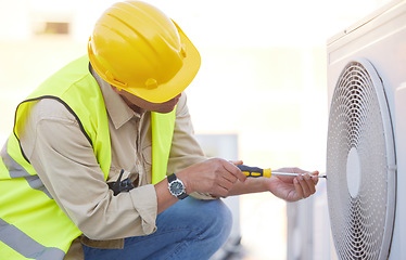 Image showing Air conditioning, technician or engineer on roof for maintenance, building or construction of fan hvac repair. Air conditioner, handyman or worker with tools working on a city development project job