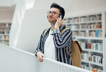 Image showing Headphones, college student man and university library work or research for learning. School campus building, music and live song streaming of a person looking for study books