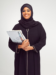 Image showing Portrait, islam and books with a student woman in studio on a gray background for learning or education. Muslim, university and study with an islamic female at college to study on a scholarship