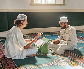 Image showing Muslim pray, worship or men studying the Quran for peace, mindfulness or support from Allah in holy mosque. Learning, Islamic or people talking, reading or praying to worship God on Ramadan Kareem