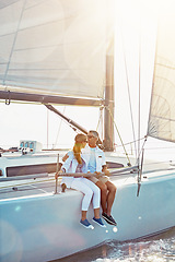 Image showing Relax, travel and luxury with couple on yacht for summer, love and sunset on Rome vacation trip. Adventure, journey and vip with man and woman sailing on boat for ocean, tropical and honeymoon at sea